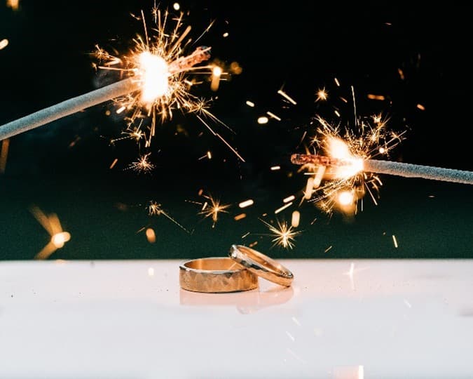 Our rings forged by our hands, now fluorishing under sparklers!